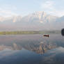 Canoe and Mountain Reflections On Pyramid Lake