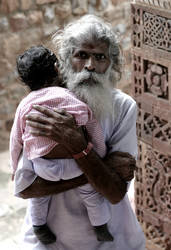 Old man and kid at monument - in colour