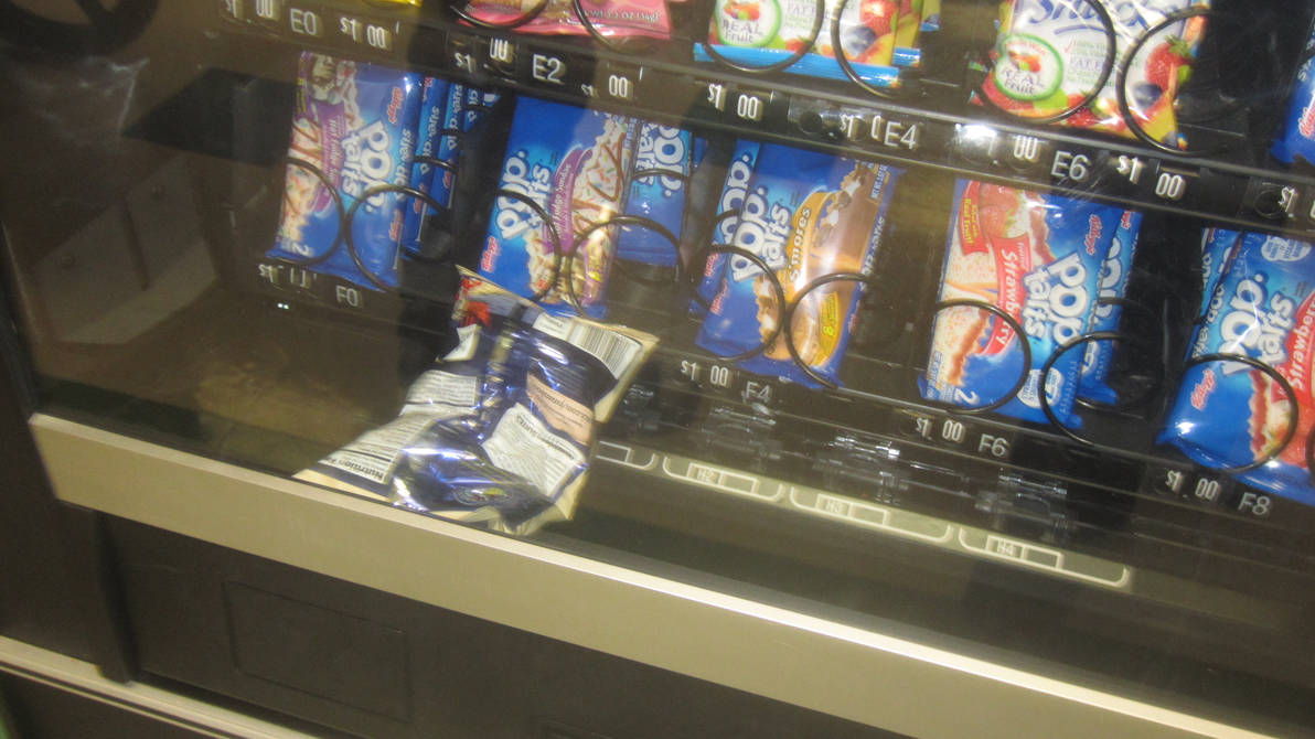 4 bags of pop corn stuck in the vending machine. You can only see