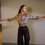 Wonder Woman transforms and runs into action
