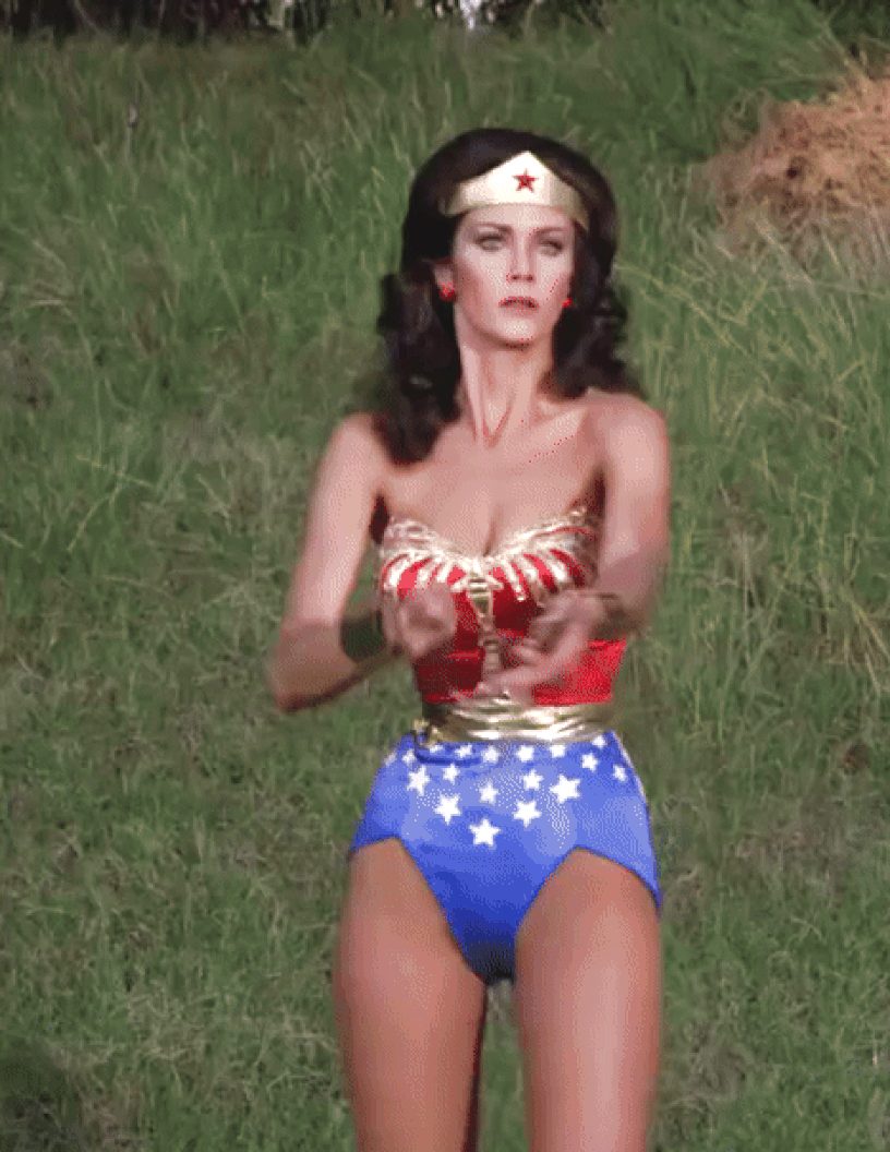 Wonder Woman getting information from a thug