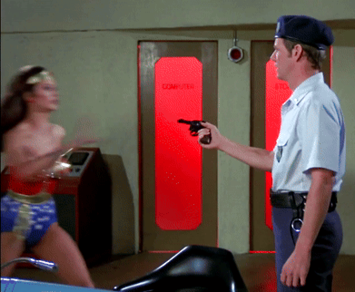 Wonder Woman disarming a man with lightning speed