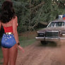 Wonder Woman stops a car and dismantles a trap