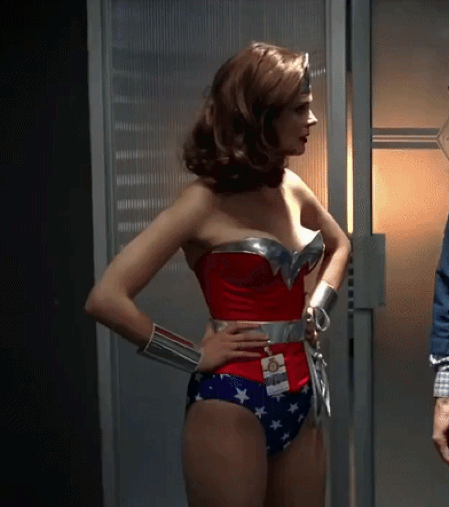 Emily Deschanel showing Wonder Woman's wonder pose
