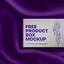 Luxury white product box on purpl silk free mockup