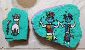 Painting Hopi on rocks