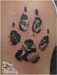 Wolf footprint tattoo