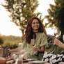 Beautiful-woman-with-red-hair-green-dress-smiling-