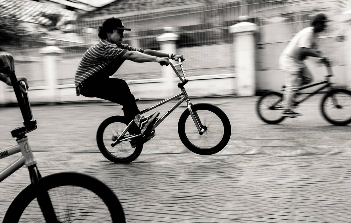 The boys were practicing bicycle on the street by HaiSon81