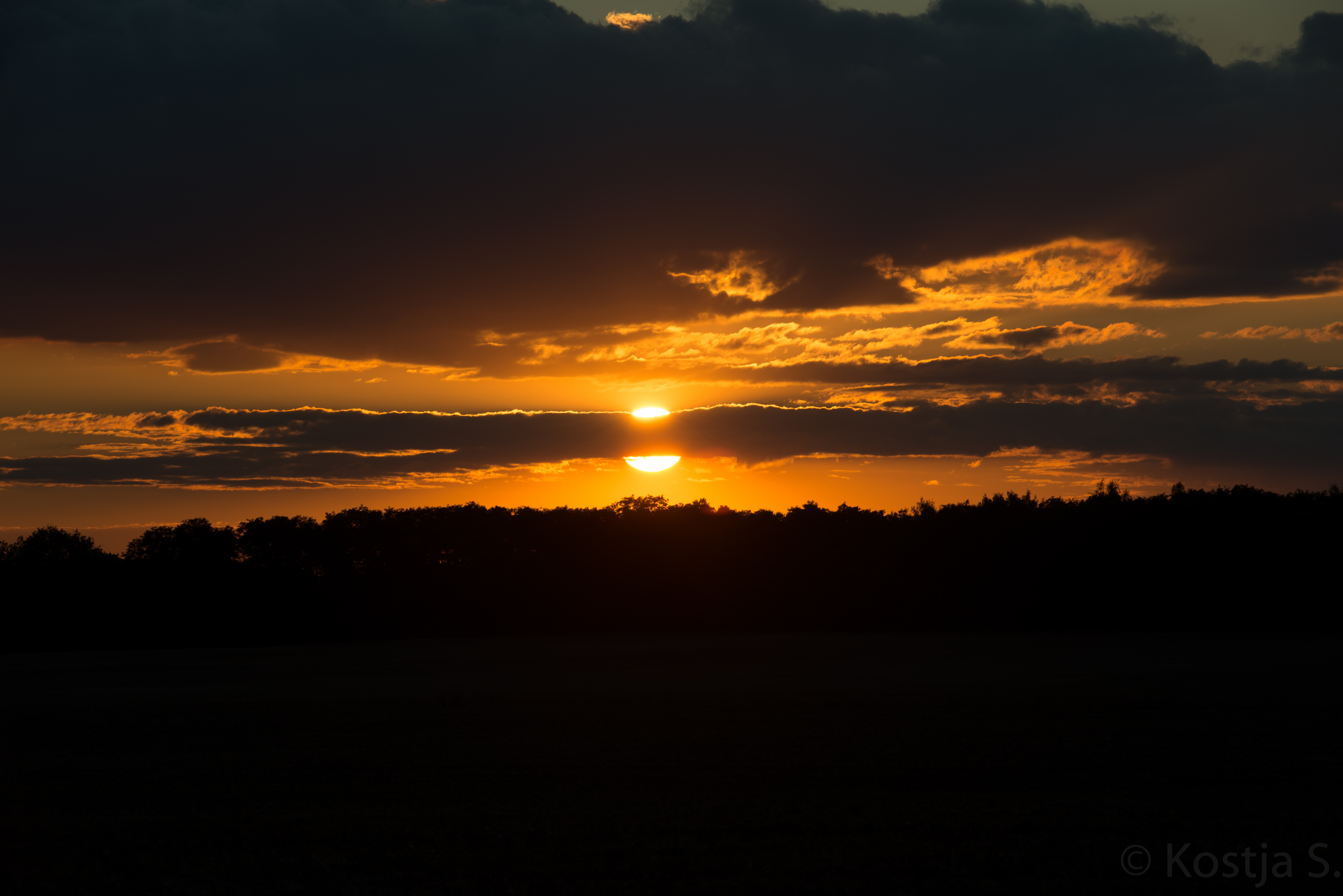 Sunset on Drizzling Fields