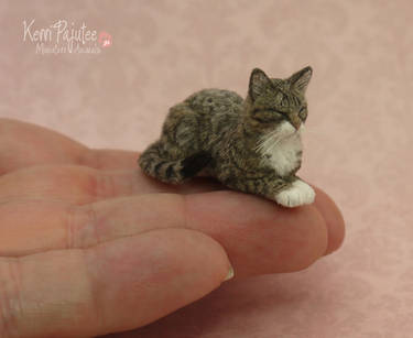 Realistic sleeping Tabby Cat sculpture