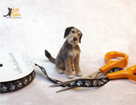 Rags, a miniature mixed breed dog sculpture