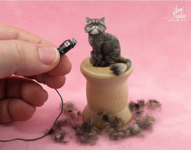 Miniature shaved Persian Cat sculpture