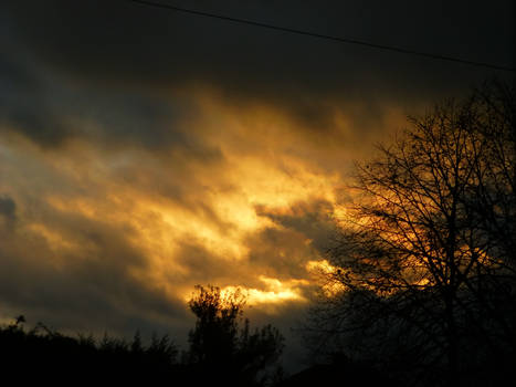 Under Dark Skies At Sunset