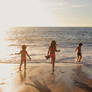 Our Kids Playing in Water Before Sunset