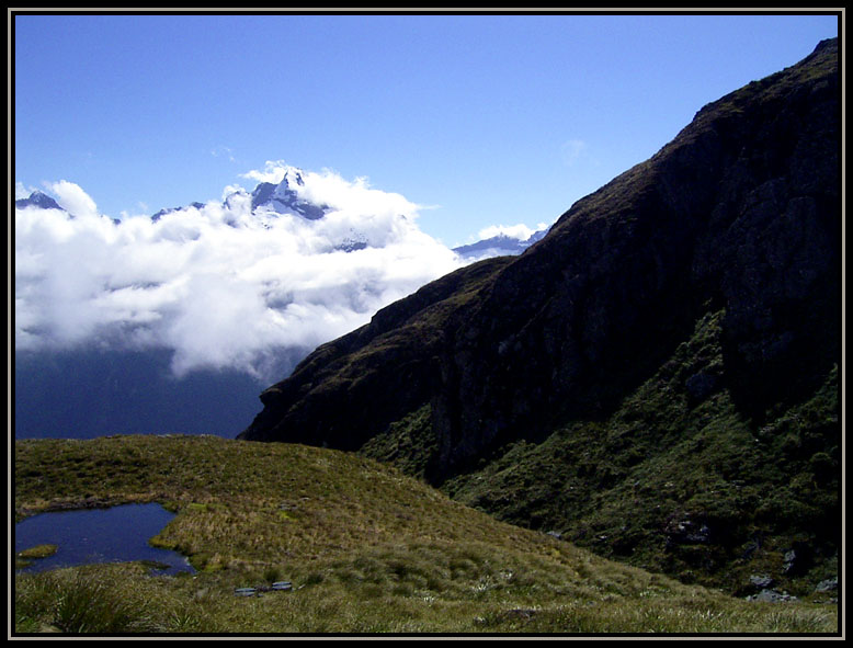 mountains behind clouds