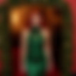 Crossdresser stationed under the mistletoe