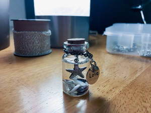 Bottle charm: ocean wish