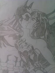 Batman and Wonder Woman kiss