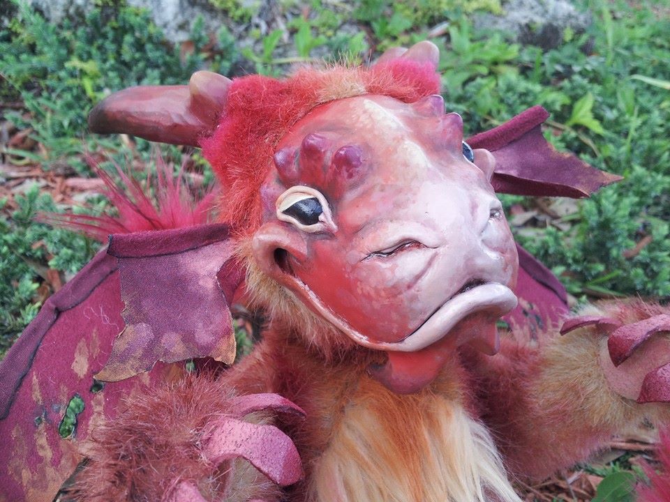 Close up of Geronimo the red dragon artdoll!