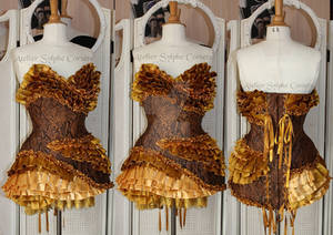 Reptil'mode corset dress with gold satin ribbons