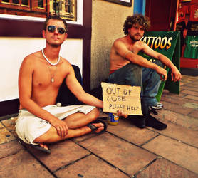 Two Guys One Sign.