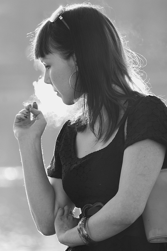 A girl having a cigarette