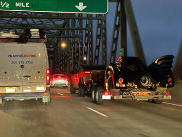 Cybertruck towing the Batmobile