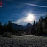 Full Moon Shining over Frozen Mangart Surroundings