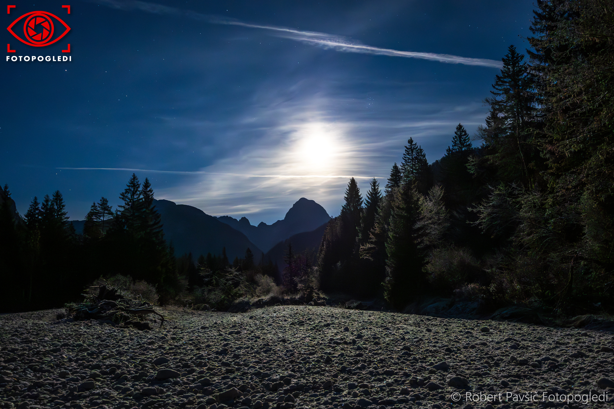 Full Moon Shining over Frozen Mangart Surroundings