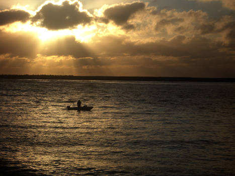 fishing at sunset