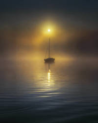 Boat at Sunrise in Fog