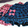 Two Tartan Skirts