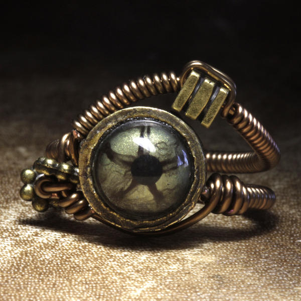 Green eye steampunk ring