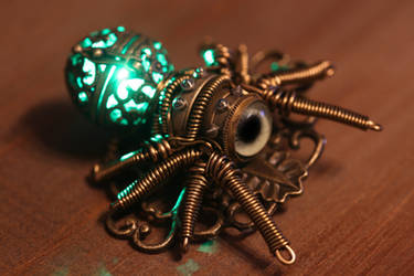 My newest creation ... a glowing spider brooch.