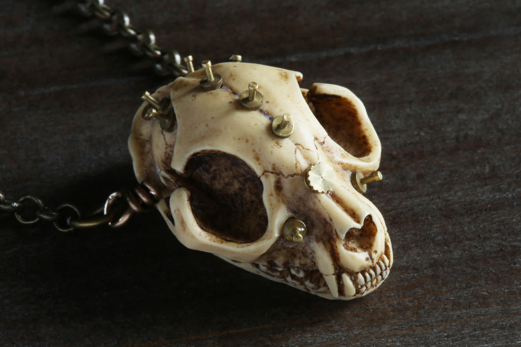 Steampunk cat skull amulet.