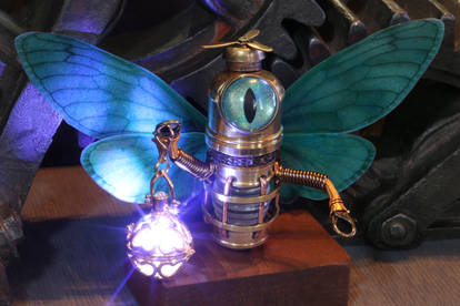 Robot Fairy with glowing lantern