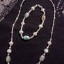 Turquoise coloured necklace with silver accenting