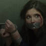 Brunette hostage tape gagged and handcuffed