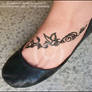 Butterfly and Vine Foot Tattoo