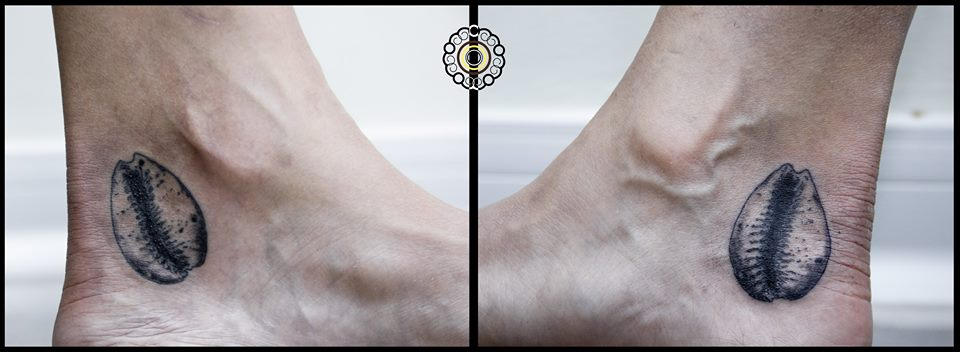 Cauri shell tattoo by LaEmbajadaTattoo on DeviantArt