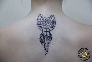 Horseshoe dreamcatcher tattoo