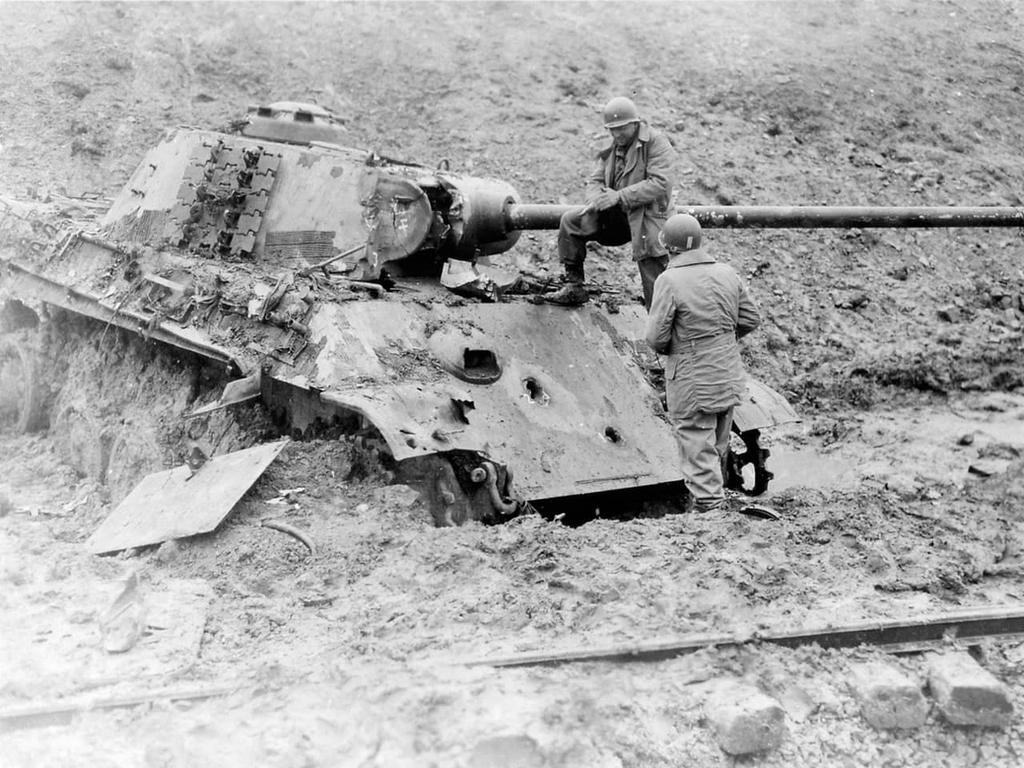 Panther Exploding US Soldiers inspect the damage to a Panther by AllAbout20CentWar on ...