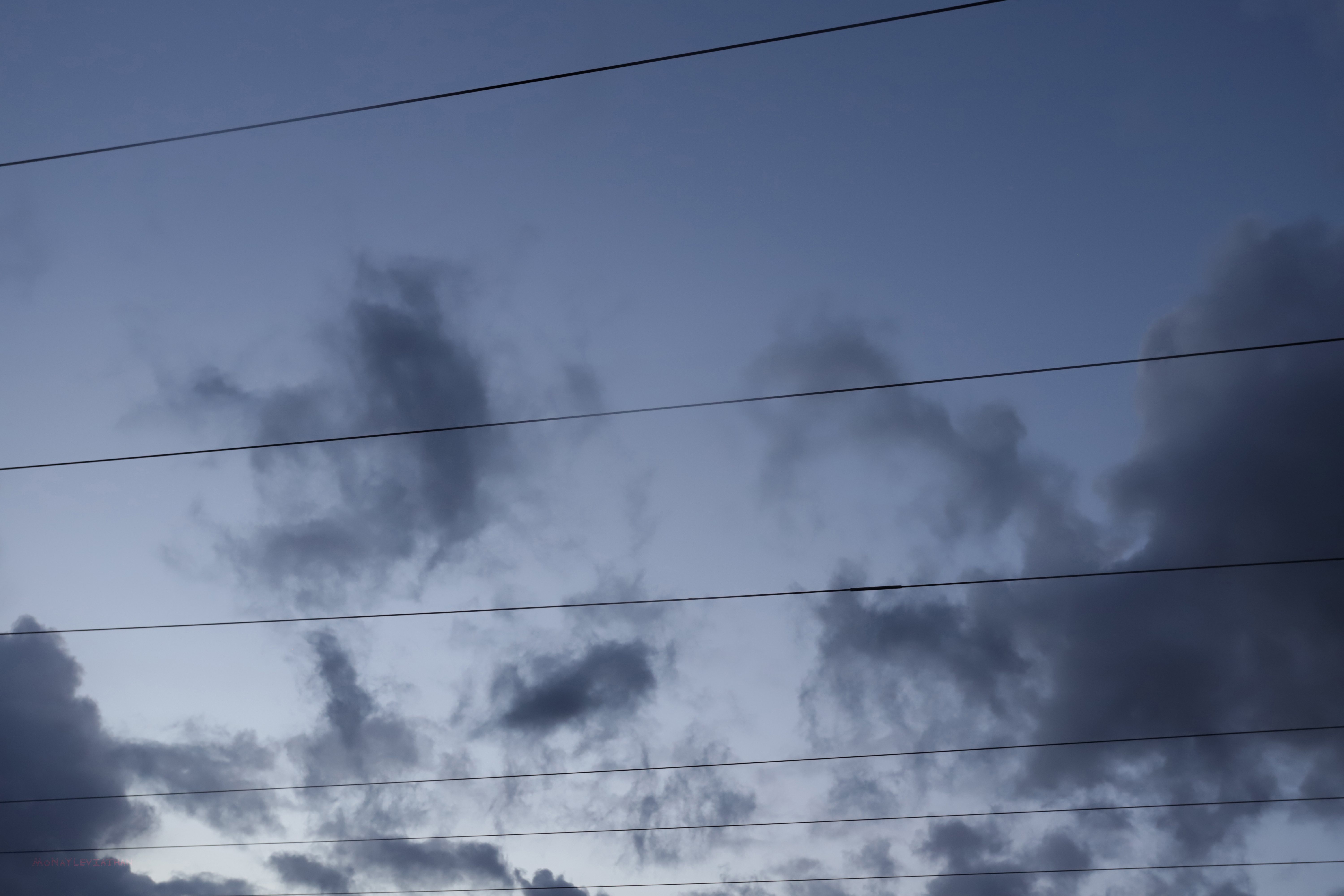 Dark Blue Gray Mysterious Beckoning Sunset Clouds