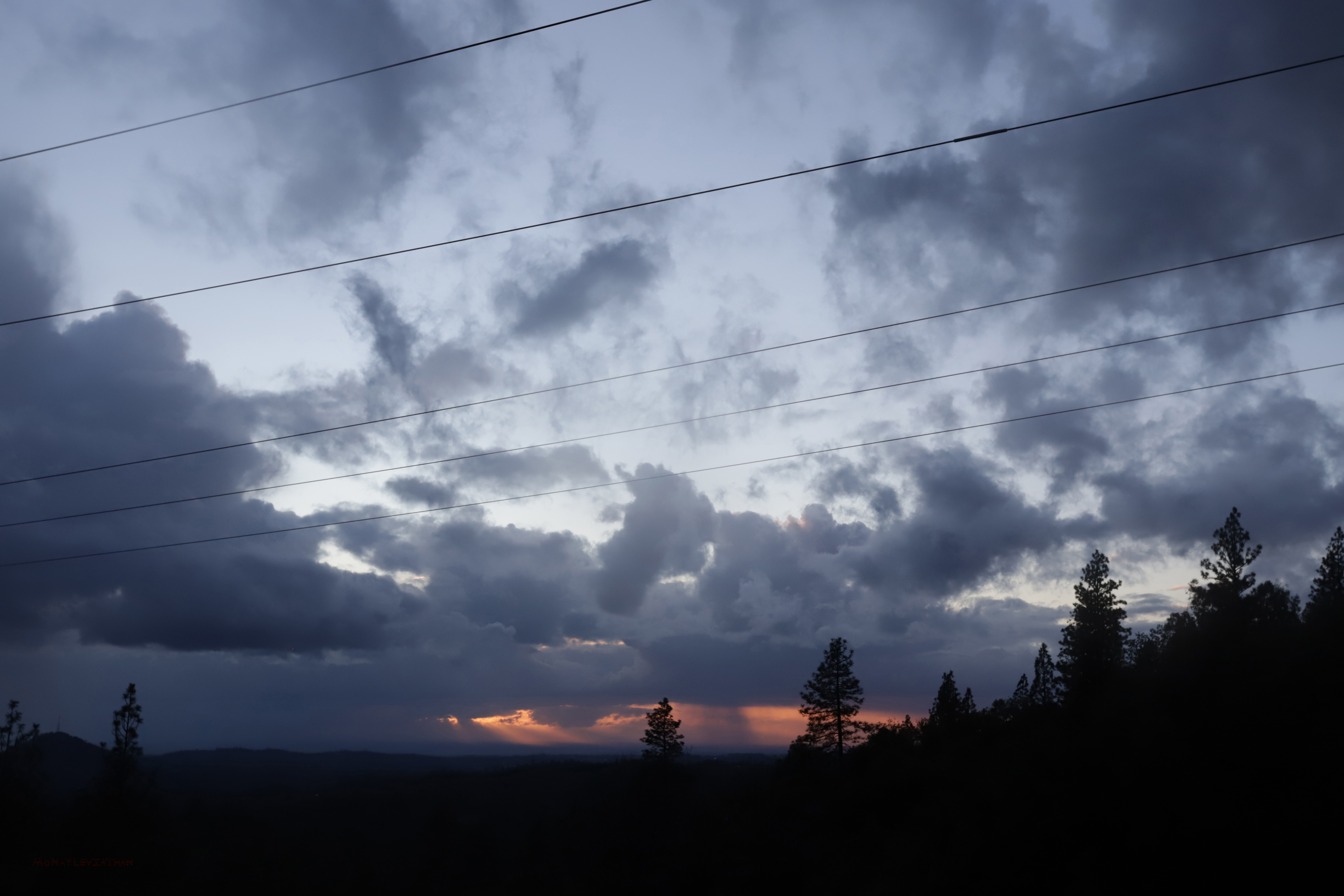 Dark Blue Gray Mysterious Beckoning Sunset Clouds