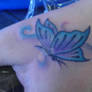 butterfly hand tattoo coverup