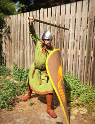 10th/11th century soldier brandishing sword