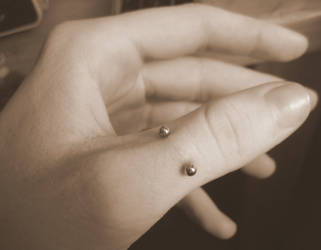 .thumb piercing.