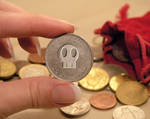Skull Coin by WallpaperMania