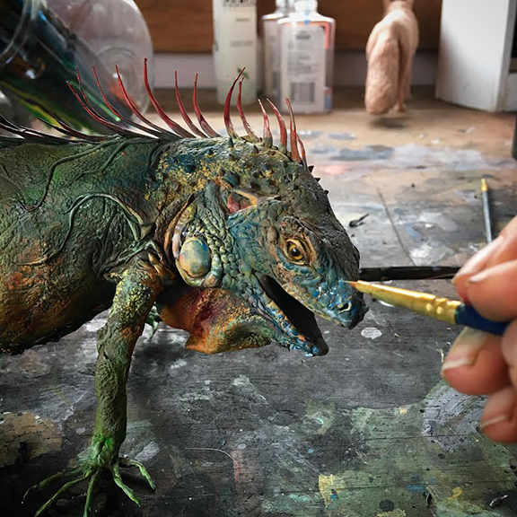 painting process on iguana